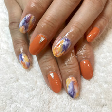 オレンジ × ペイントアートのmix春ジェルネイル